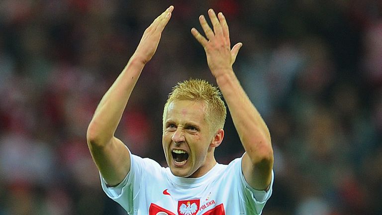 Kamil Glik of Poland celebrates scoring to make it 1-1 during the FIFA 2014 World Cup Qualifier between Poland and England