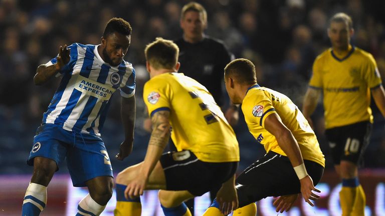 Kazenga LuaLua of Brighton takes on the Wigan defence during the Sky Bet Championship match between Brighton & Hove Albion and Wigan