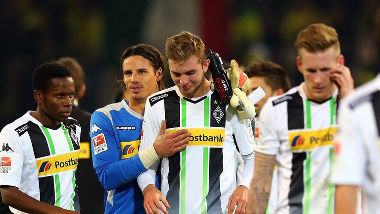 Yann Sommer consoles Christoph Kramer after Gladbach's defeat