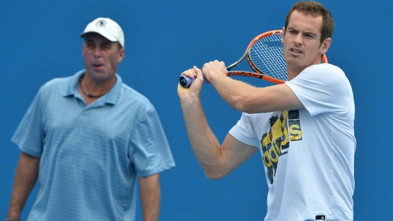 Britain's Andy Murray (R) is watched by coach Ivan Lendl during a practice session ahead of the 2014 Australian Open