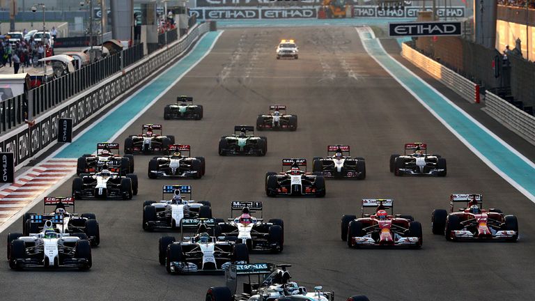 Lewis Hamilton leads Nico Rosberg at the first corner