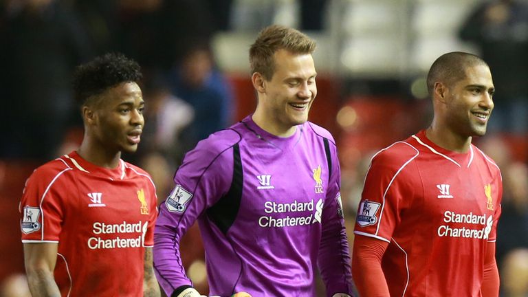 Liverpool's Raheem Sterling, Simon Mignolet and Glenn Johnson celebrate victory against Stoke