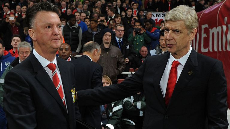 Arsene Wenger greets Louis van Gaal