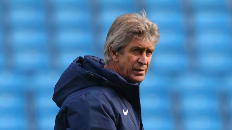 MANCHESTER, ENGLAND - NOVEMBER 04:  Manuel Pellegrini the manager of Manchester City looks on during a training session at the Etihad Stadium on November 4