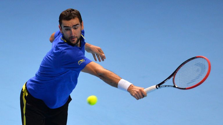 Croatia's Marin Cilic returns to Czech Republic's Tomas Berdych during day four of the ATP World Tour Finals