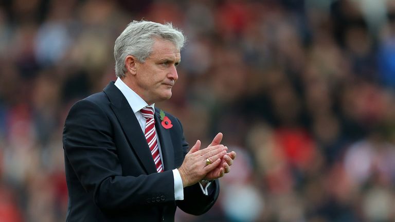 STOKE ON TRENT, ENGLAND - NOVEMBER 01:  Stoke City Manager Mark Hughes applauds his players during the Barclays Premier League match between Stoke City and