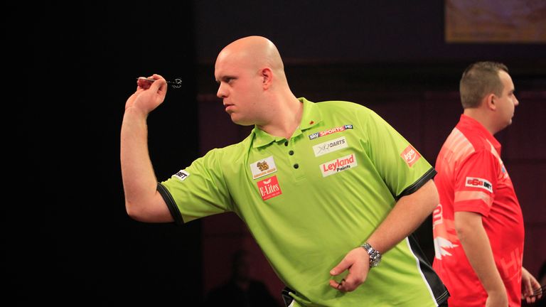Turning his back: Michael van Gerwen throwing against Kim Huybrechts