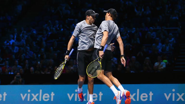 Mike Bryan of the United States and Bob Bryan of the United States celebrate match point 