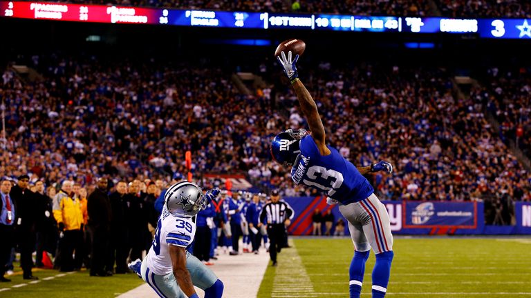 EAST RUTHERFORD, NJ - NOVEMBER 23:  Odell Beckham #13 of the New York Giants scores a touchdown in the second quarter against the Dallas Cowboys at MetLife