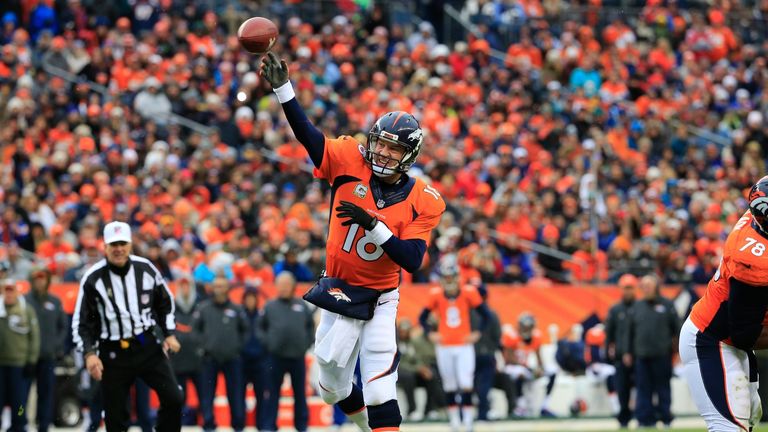 Peyton Manning Denver Broncos throws a second quarter touchdown pass to wide receiver Demaryius Thomas v Miami Dolphins