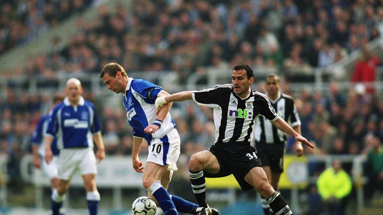 NEWCASTLE - MARCH 29:  Duncan Ferguson of Everton holds the ball up against Nikos Dabizas of Newcastle United during the FA Barclaycard Premiership match p