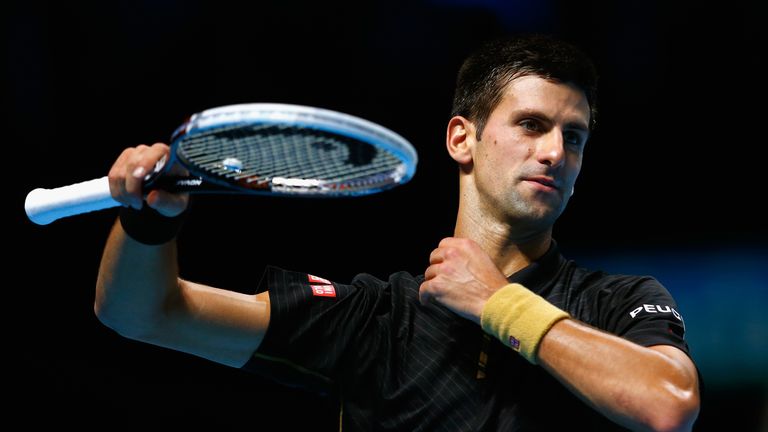 Novak Djokovic of Serbia looks on in the singles semi-final match against Kei Nishikori of Japan on day seven of the Barclays ATP World Tour Finals
