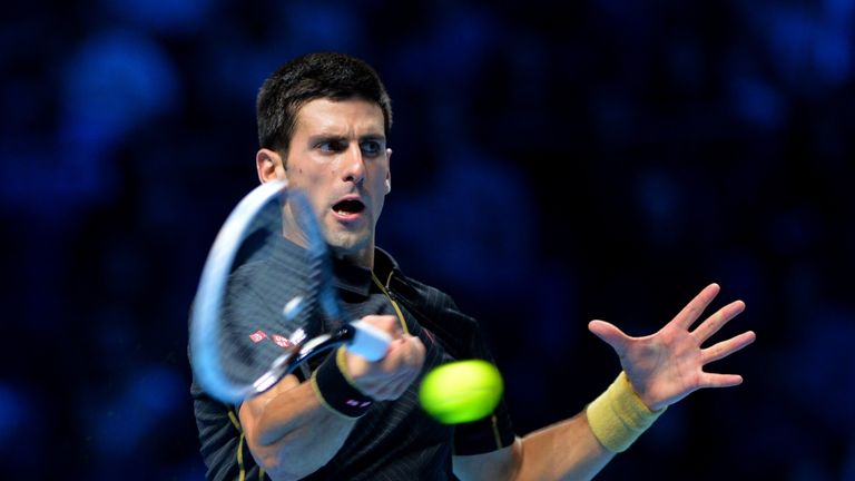 Serbia's Novak Djokovic returns to Britain's Andy Murray during an exhibition match on day eight of the ATP World Tour Finals