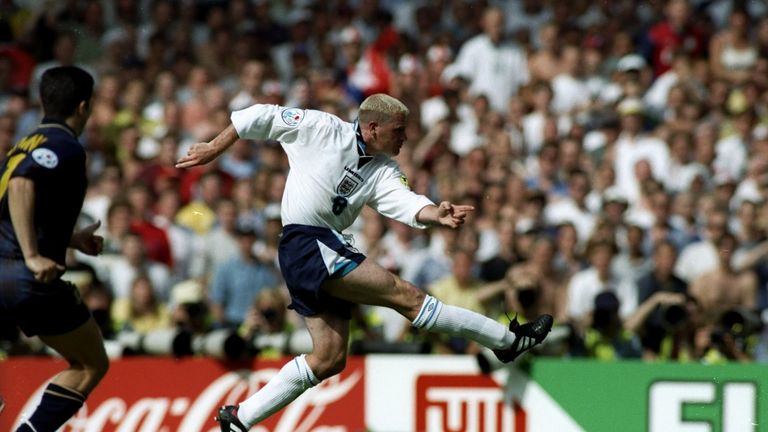 Paul Gascoigne of England scores their second goal during the European Championship match against Scotland at Wembley Stadium in Euro 96