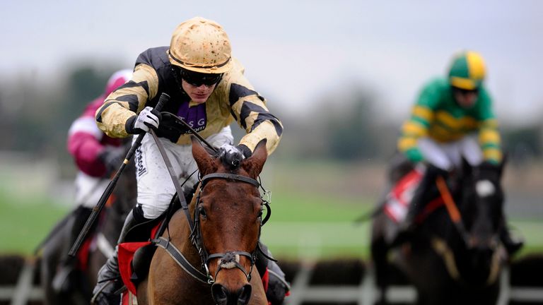 RATOATH, IRELAND - NOVEMBER 30:  Paul Townend riding Nichols Canyon clears the last to win The Bar One Racing Royal Bond Novices Hurdle at Fairyhouse.