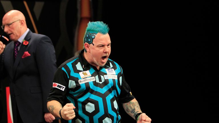 Peter Wright  will play Phil Taylor in the last 16 of the Grand Slam of Darts
