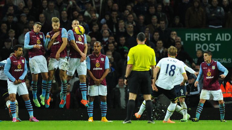 Tottenham striker Harry Kane (18) strikes the second goal from a free kick during the Premier League match at Aston Villa
