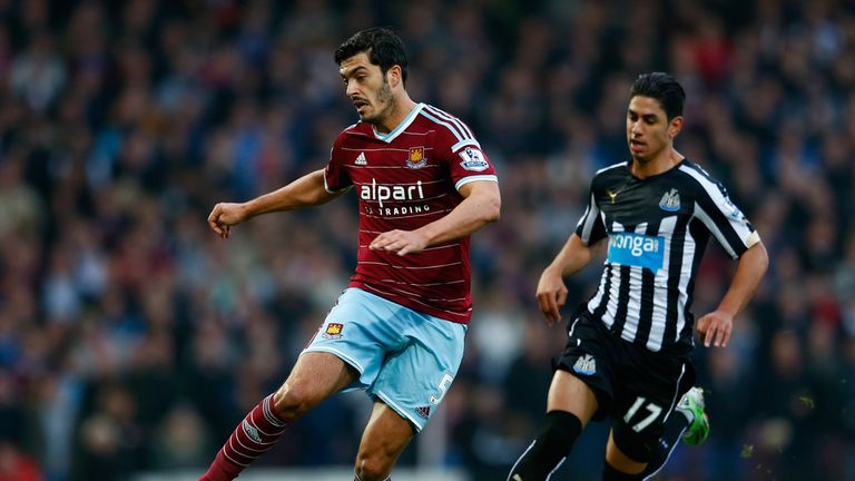 James Tomkins of West Ham is closed down by Ayoze Perez of Newcastle United