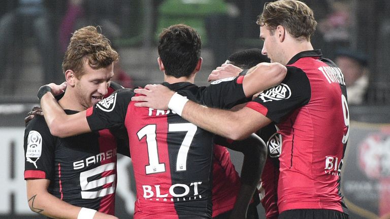 Rennes' players celebrate after Monaco's Tunisian defender Aymen Abdennour (not in picture) scored a goal 