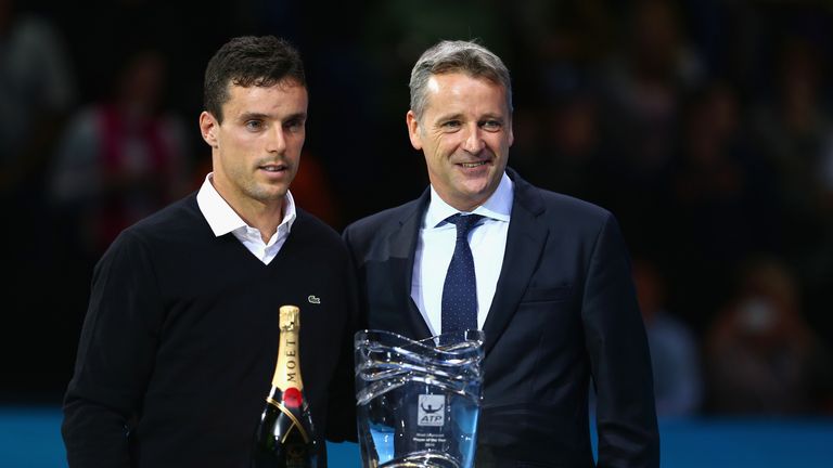 Roberto Bautista Agut  is presented with the ATP Most Improved Player of the Year Award by Chris Kemode, Tournament Chairman of the ATP World Tour Finals