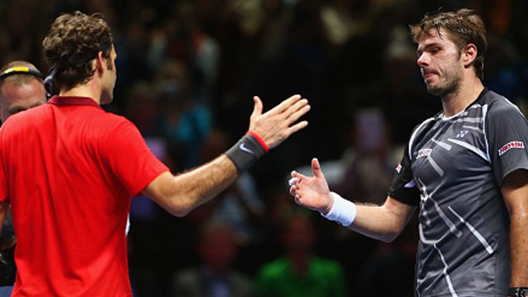 Roger Federer shakes hands with Stan Wawrinka following their semi-final in London last Saturday