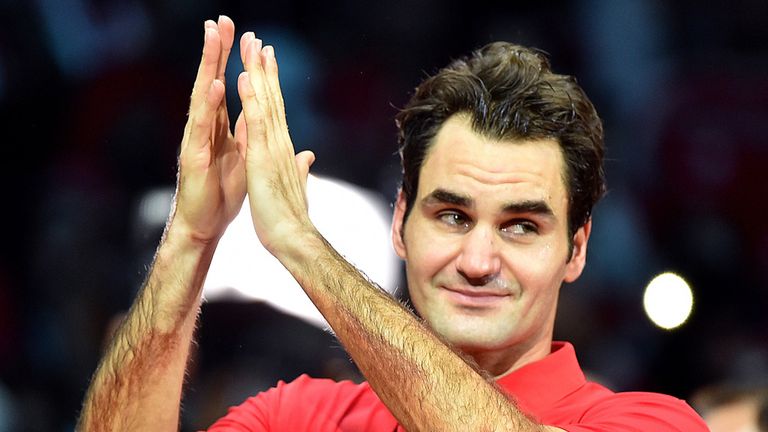 Switzerland's Roger Federer celebrates after winning the Davis Cup final
