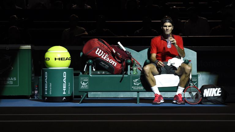 Switzerland's Roger Federer rests during the third round match against France's Lucas Pouille at the ATP World Tour Masters 1000 indoor tennis tournament o