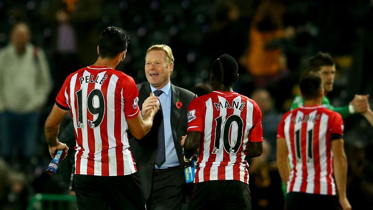 Southampton manager Ronald Koeman congratualtes the players at the final whistle at Hull