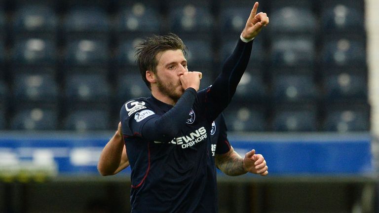 Ross County star Graham Carey celebrates his opening goal