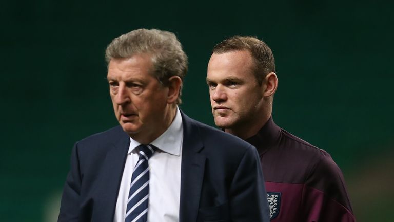 England striker Wayne Rooney and manager Roy Hodgson at Celtic Park in Glasgow, Scotland