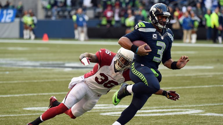 Russell Wilson of the Seattle Seahawks runs the ball against Arizona Cardinals