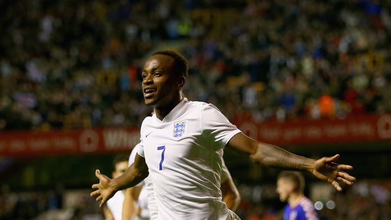 Saido Berahino of England U21s runs away to celebrate after scoring his team's second goal from the penalty spot v Croatia