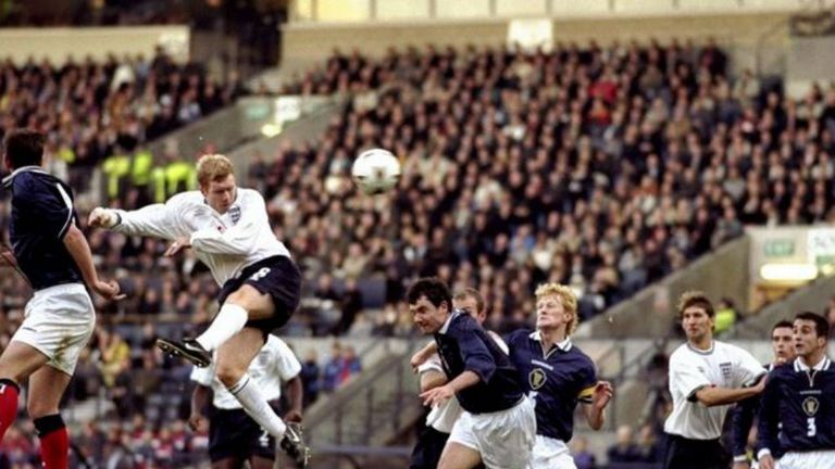 Paul Scholes heads in for England against Scotland in 1999
