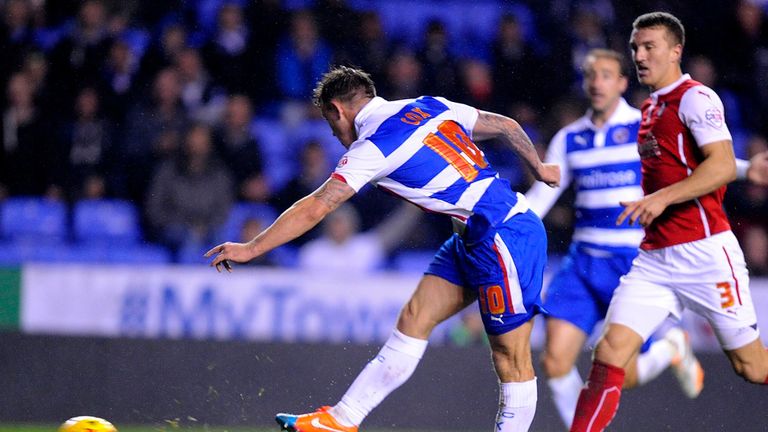 Reading's Simon Cox scores his side's second goal of the game during the Sky Bet Championship match at the Madejski Stadium, Reading.