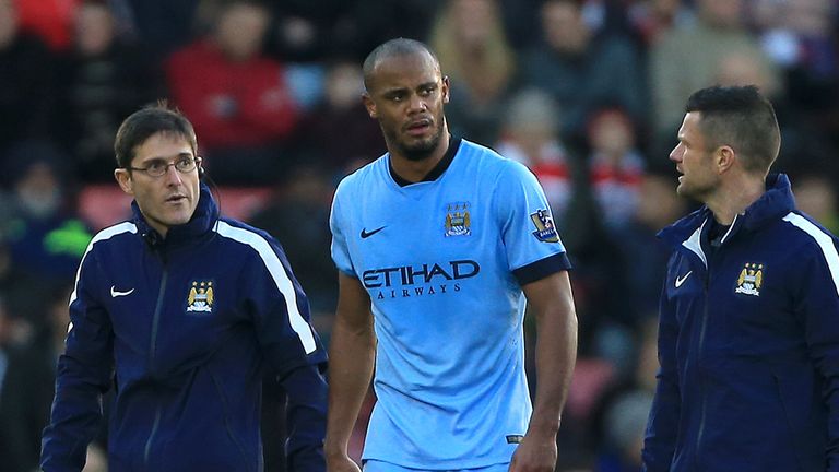 Manchester City's Vincent Kompany walks off the pitch with an injury during the Barclays Premier League match at St Mary's Stadium, Southampton.