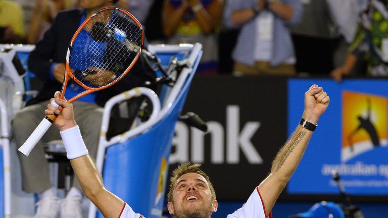 Switzerland's Stanislas Wawrinka celebrates after his victory against Spain's Rafael Nadal during the men's singles final on day 14 of the 2014 Australian 