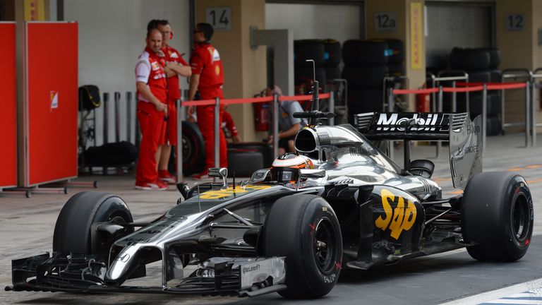 Stoffel Vandoorne returns to the pits after his first lap of the day