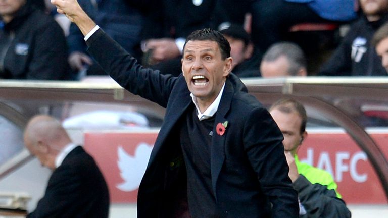 Sunderland manager Gus Poyet gestures to his players