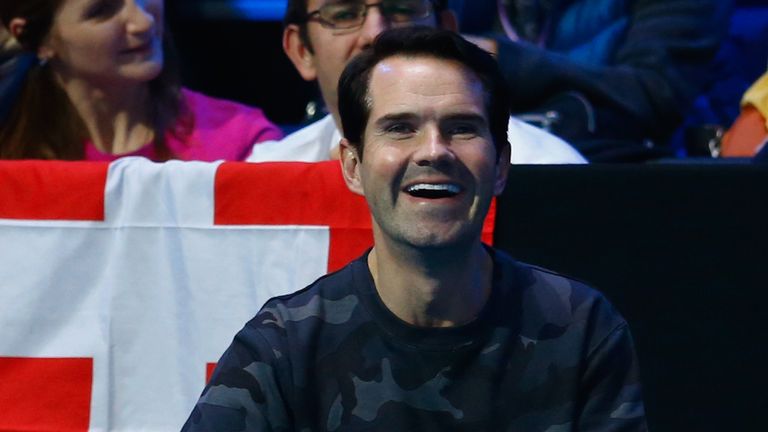 Comedian Jimmy Carr watches Novak Djokovic compete in the round robin singles match against Stan Wawrinka at the ATP World Tour Finals in London