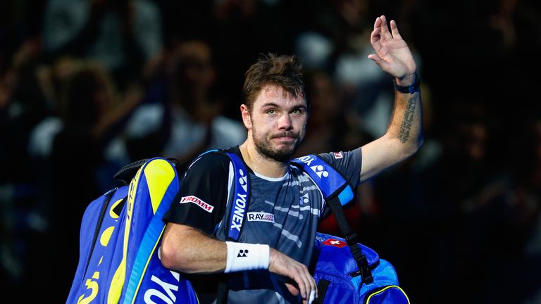Stan Wawrinka of Switzerland waves after defeat in the round robin singles match against Novak Djokovic of Serbia