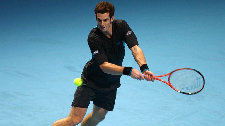 Andy Murray returns the ball against Fernando Verdasco at the ATP World Tour Finals 2009