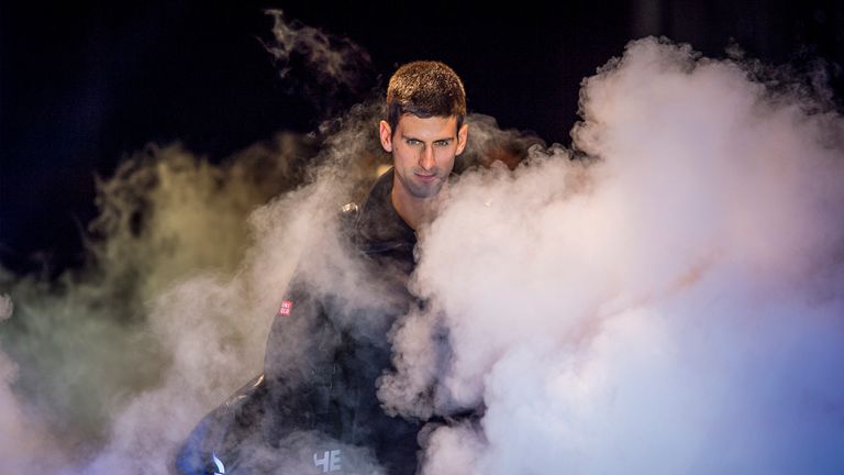 Novak Djokovic of Serbia enters the court ahead of his round robin singles match against Stan Wawrinka of Switzerland at the ATP World Tour Finals