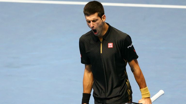 Novak Djokovic celebrates a point in the semi-final match against Kei Nishikori at the ATP World Tour Finals