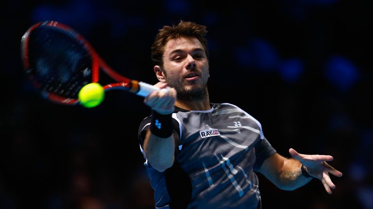 Stan Wawrinka plays a forehand in the round robin singles match against Marin Cilic at the ATP World Tour Finals in London