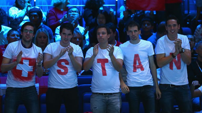 Swiss fans shows their colours as they watch Stan Wawrinka of Switzerland play at the ATP World Tour Finals