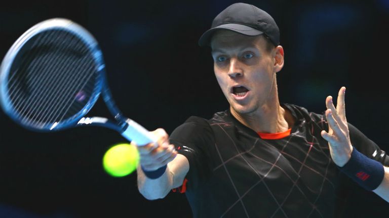 Tomas Berdych plays a forehand in the round robin singles match against Marin Cilic at the ATP World Tour Finals