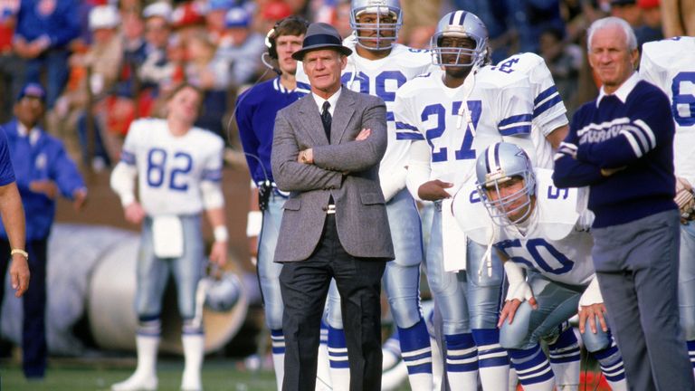 Head coach Tom Landry of the Dallas Cowboys watches from the sideline during a game in the 1988 season.