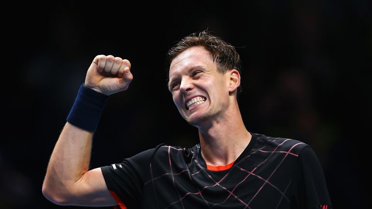 Tomas Berdych of Czech Republic celebrates match point against Marin Cilic at the ATP World Tour Finals