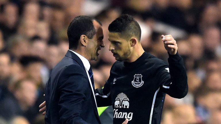 Everton's Kevin Mirallas celebrates scoring the opening goal of the game with his manager Roberto Martinez during the Barclays Premier League match