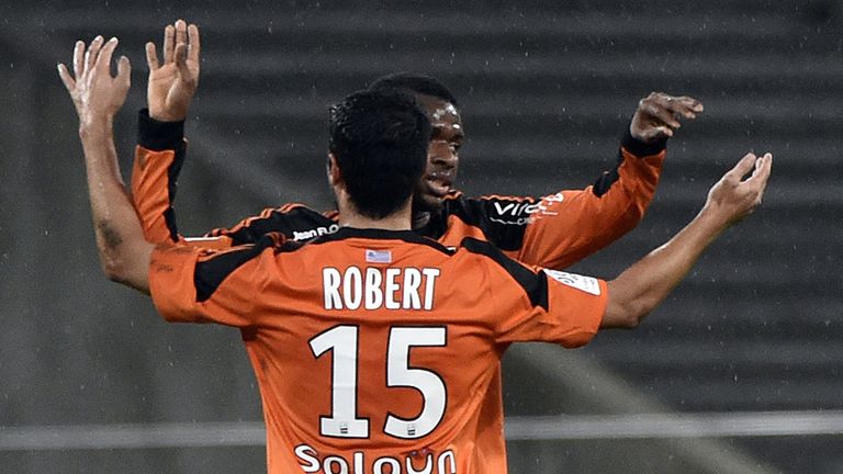 Lorient's players celebrates at the end of the French L1 football match against Toulouse
